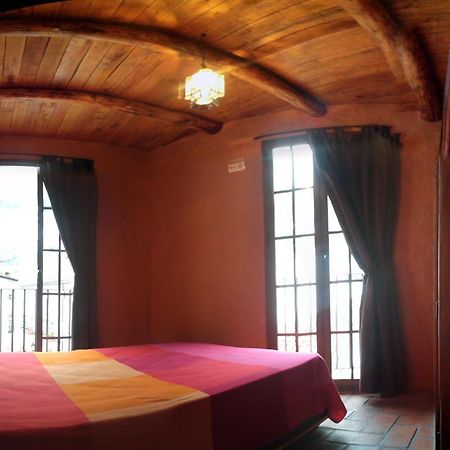 Jade Hotel Ubrique Szoba fotó